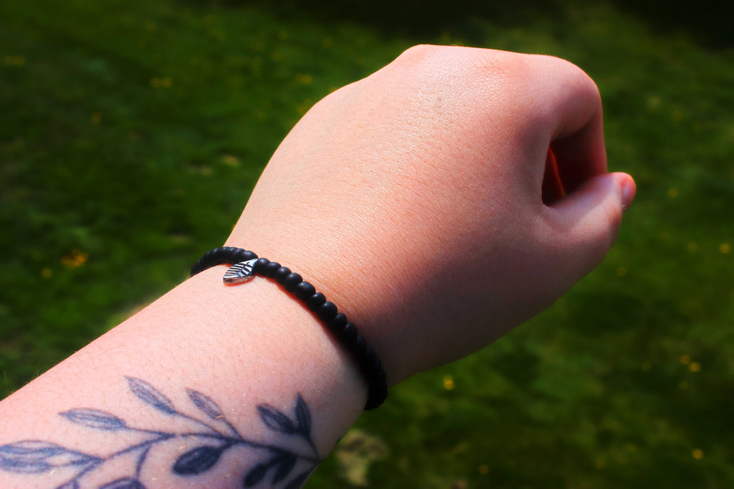 Handmade Black Beaded Bracelet with Silver Leaf Centerpiece