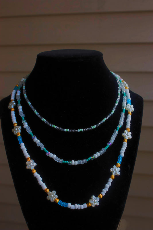Handmade Three-Tiered Beaded Necklace – Light Blue, White & Floral Accents