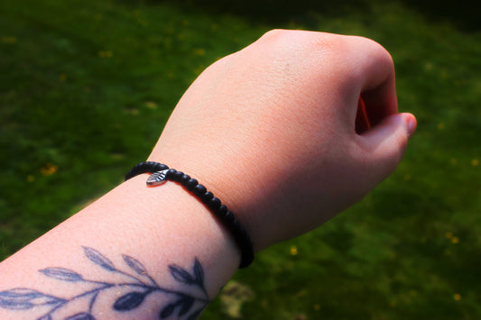 Handmade Black Beaded Bracelet with Silver Leaf Centerpiece