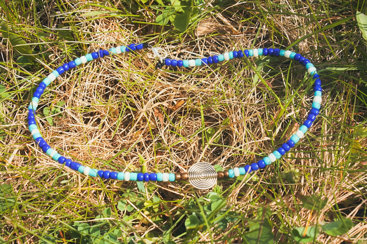 Handcrafted Glass Bead Necklace with Silver Swirl Accent